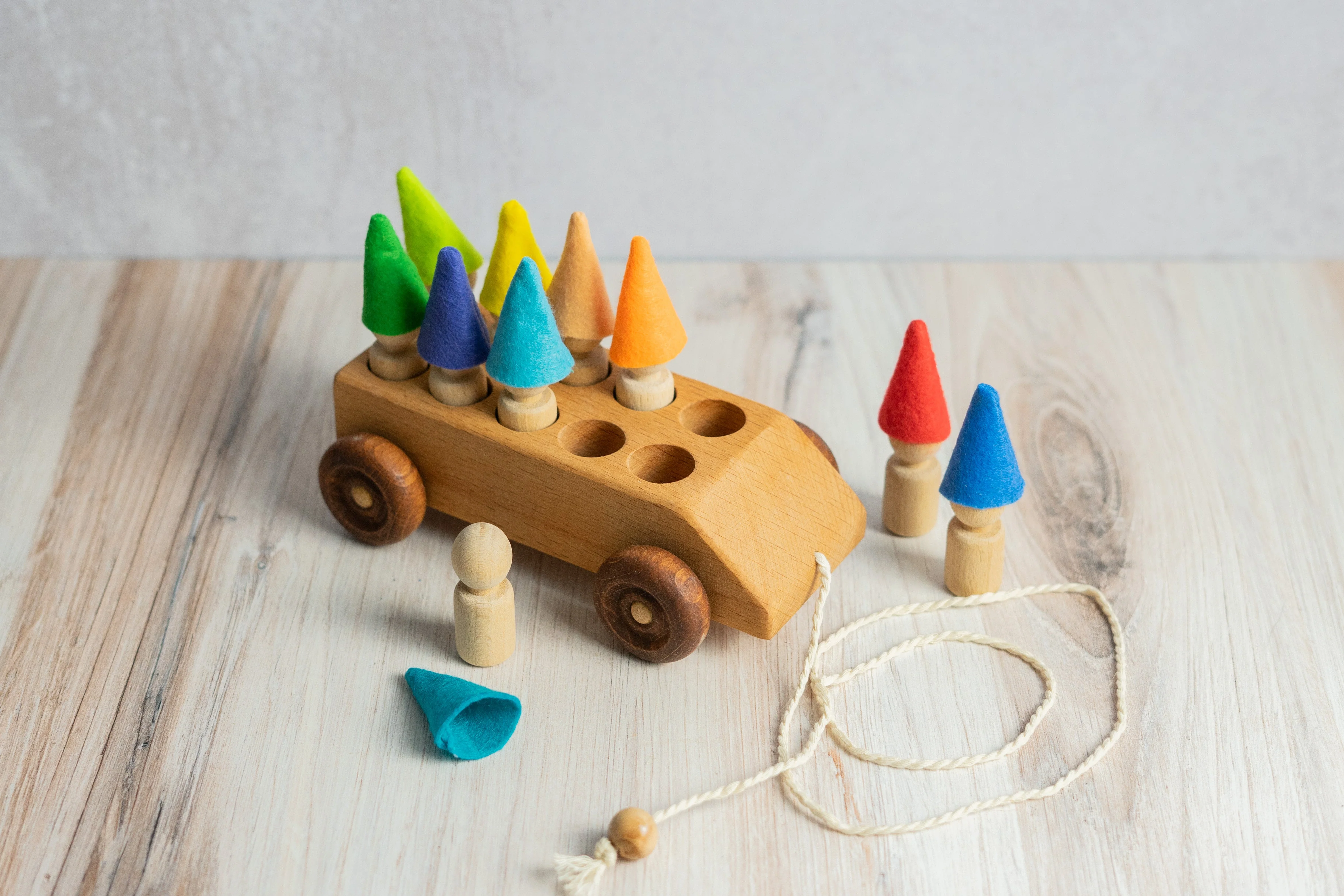 PoppyBabyCo Wooden Toy Car with ten Pegs in Multi-Colored Hats